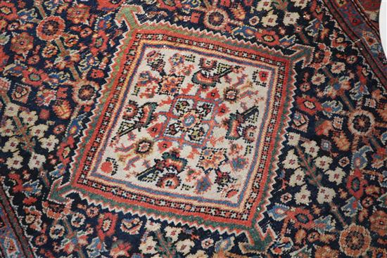 A Caucasian blue ground rug 200 x 138cm